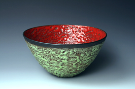 13. Large thrown bowl with volcanic copper green exterior and deep red crawl melt interior.