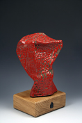 5. Assembled and carved angular block sculpture with red crawling stoneware glaze mounted on oak base