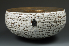 2. Thrown and assembled double walled bowl with white crawling glaze and bronzed upper