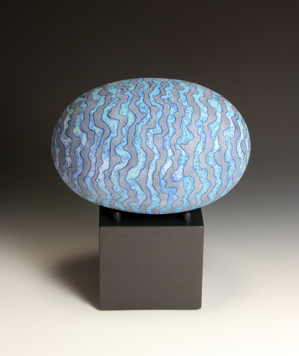 Dark Blue Egg Form on Stone Base