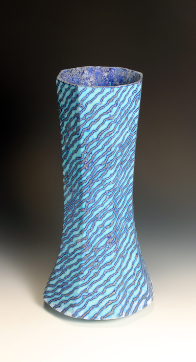Tall Facetted Vessel with Spiral Blue Pattern