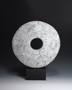 32. White Spiral Disc on Stone, 40cm high