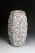 20. Yellow red black and white facetted ground vessel