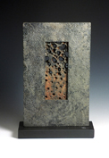 23. Cast iron form on stone base, 29cm high