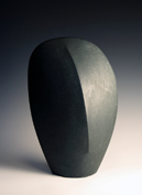 11. Head form in bursting stone 46cm high