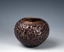 26. Purple crawl thrown bowl.