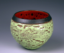 25. Copper green crawling bowl with red crawling interior.