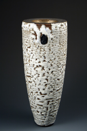 8. Thrown and assembled double walled bowl with white crawling glaze and bronzed upper