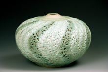50. Banded "urchin" form bottle.  12cm H x 16cm W.