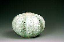 51. Banded "urchin" form. 10cm H x 12cm W.