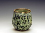 47. Thrown carved vase.  9cm H x 8cm W.