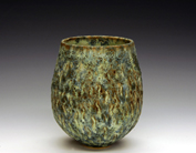 49. Carved, thrown vessel form.  16cm H x 12cm W.
